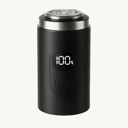 Black electric shaver with digital display on a white background