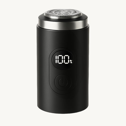 Black electric shaver with digital display on a white background