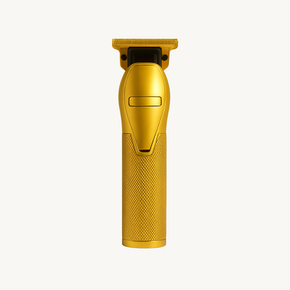 Gold hair trimmer on a white background