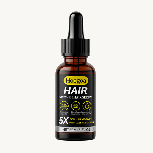 Hoegoa Hair Growth Serum – 30 ml brown dropper bottle with black label and yellow accents, shown on a white background